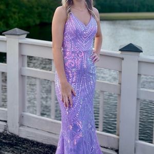 Jovani prom dress lilac. Dress was altered mostly for length. Model is 5’8”.